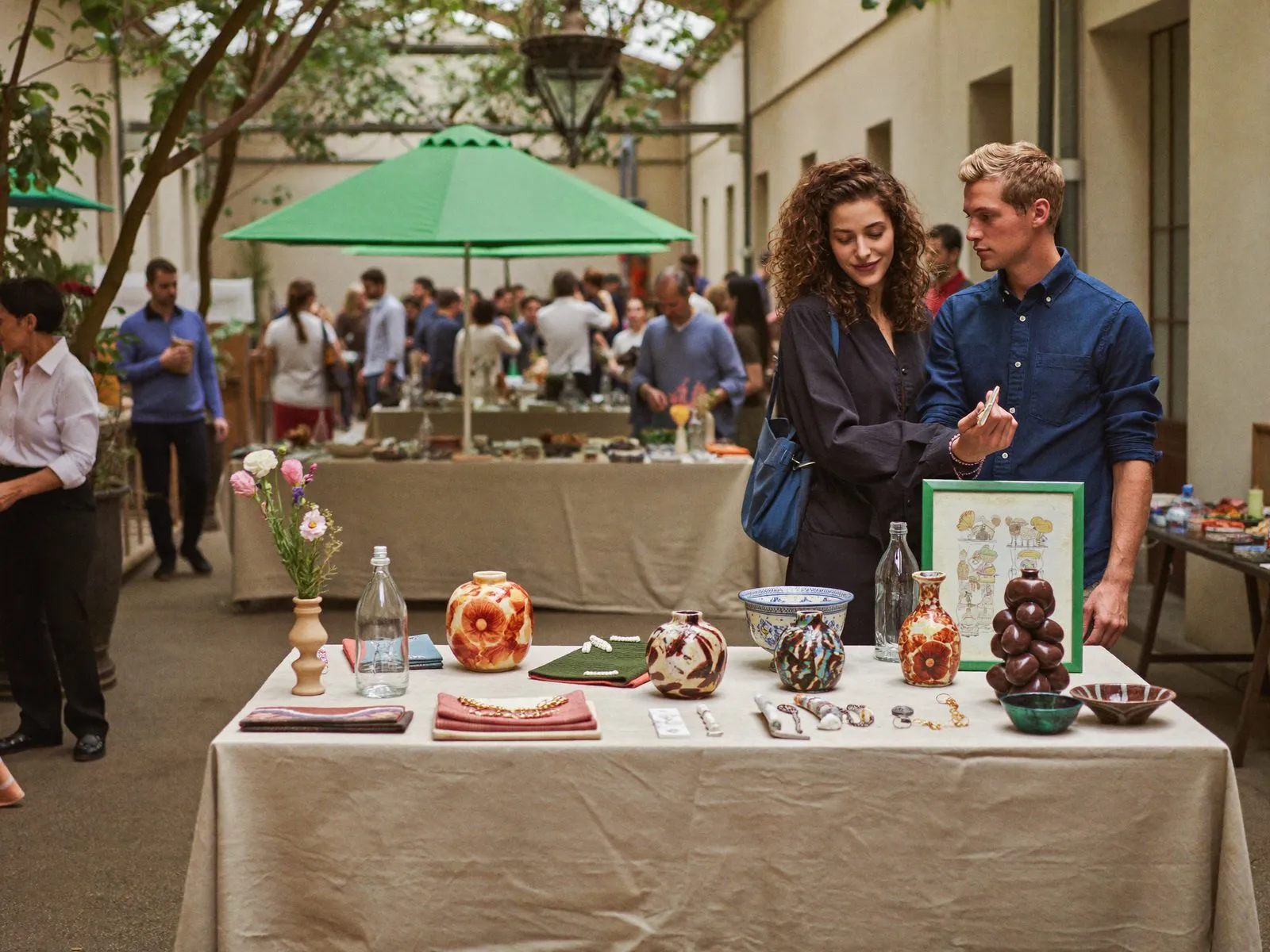 A curated craft market with handmade ceramics and textiles